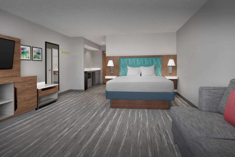 Suite, One King Bed, Non-Smoking | Pillowtop beds, desk, laptop workspace, blackout drapes