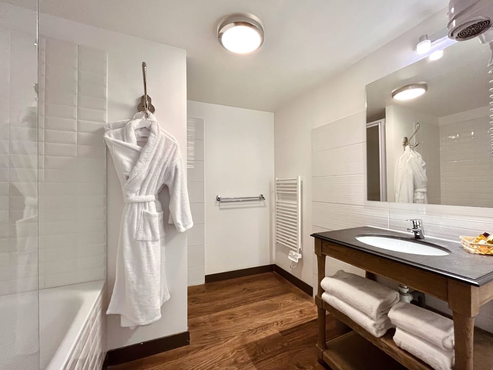 Prestige Twin Room | Bathroom | Designer toiletries, hair dryer, towels, soap