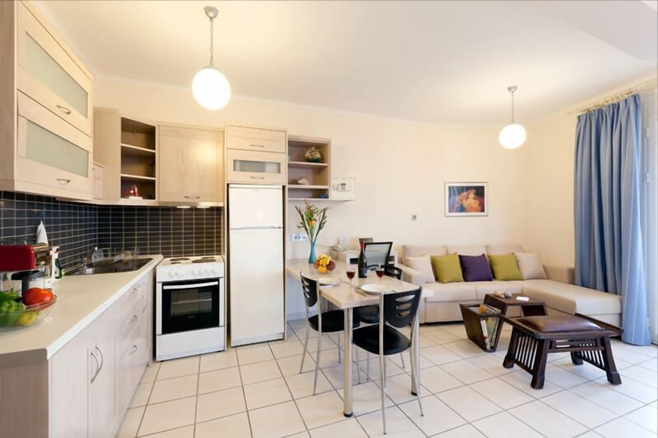 Apartment, 1 Bedroom, Balcony, Sea View | Private kitchen | Full-size fridge, microwave, oven, stovetop
