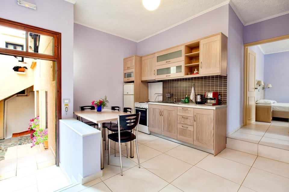 Apartment, 2 Bedrooms, Sea View | Private kitchen | Full-size fridge, microwave, oven, stovetop