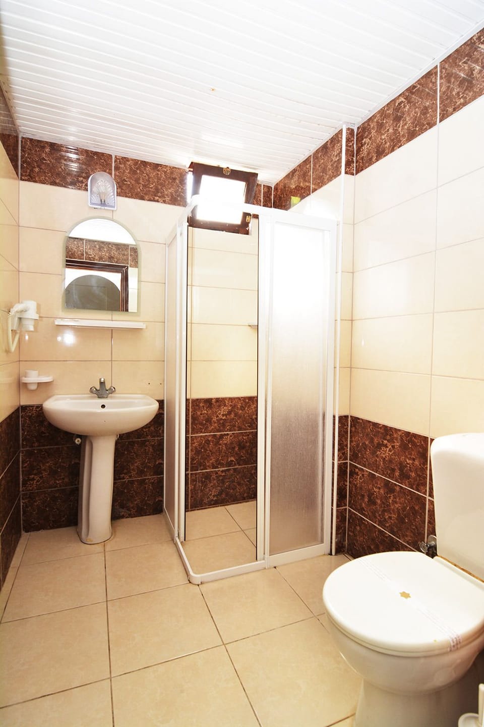 Shower, free toiletries, hair dryer, towels