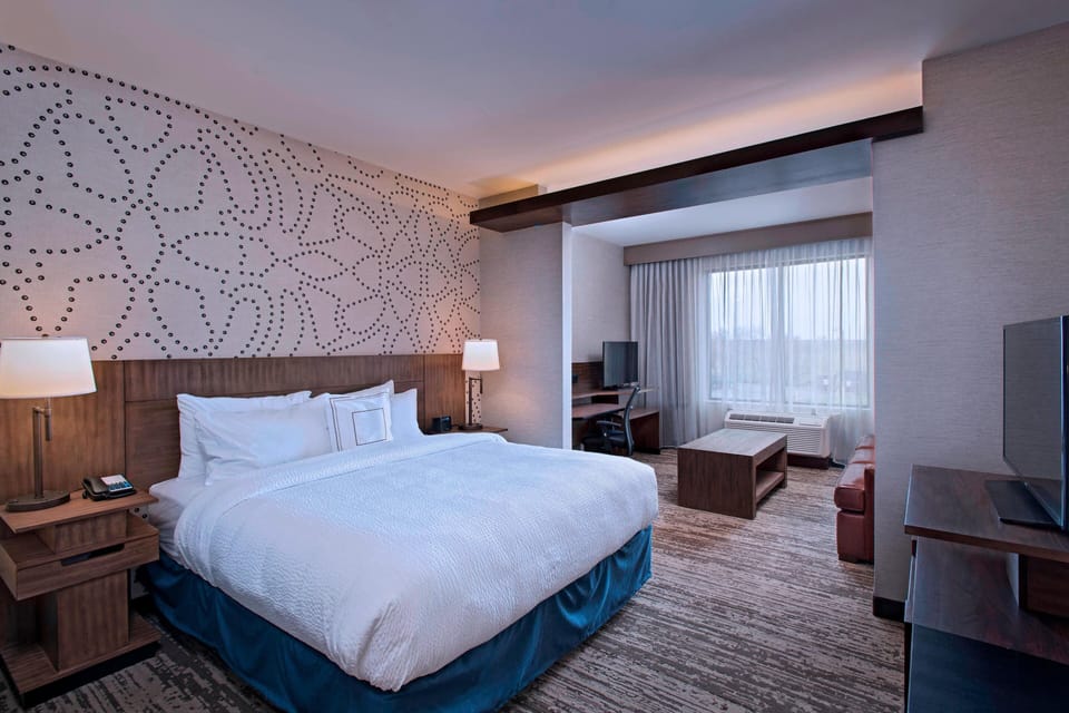 Suite, 1 King Bed with Sofa bed | In-room safe, desk, blackout drapes, iron/ironing board