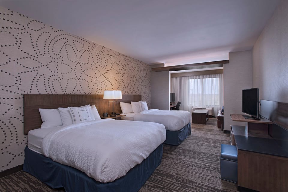 Suite, Multiple Beds | In-room safe, desk, blackout drapes, iron/ironing board