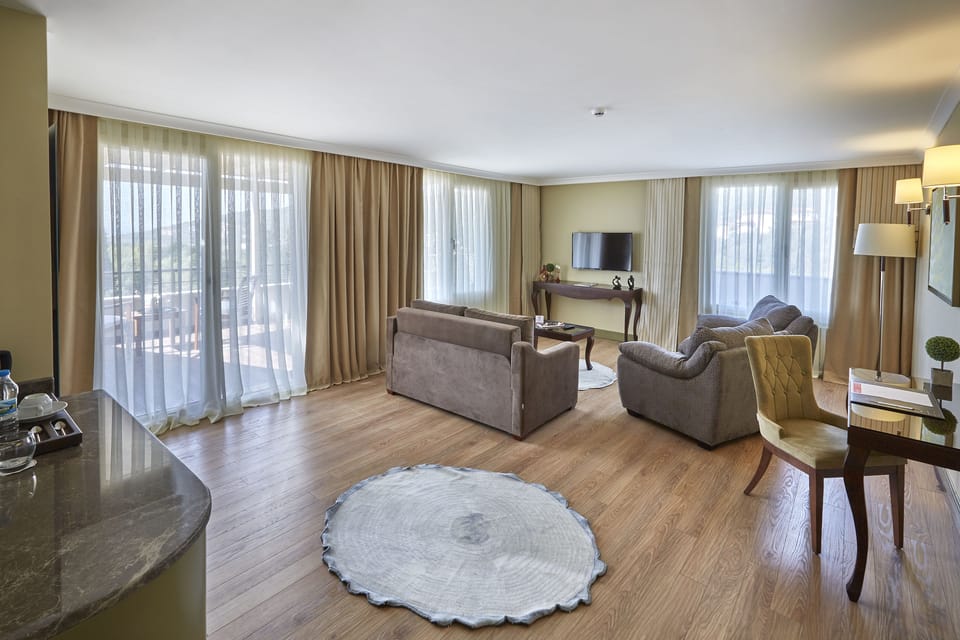 Presidential Suite, 1 King Bed | Living area | LED TV