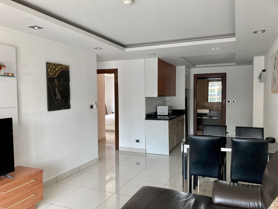 Condo, 2 Bedrooms | Living area | Flat-screen TV