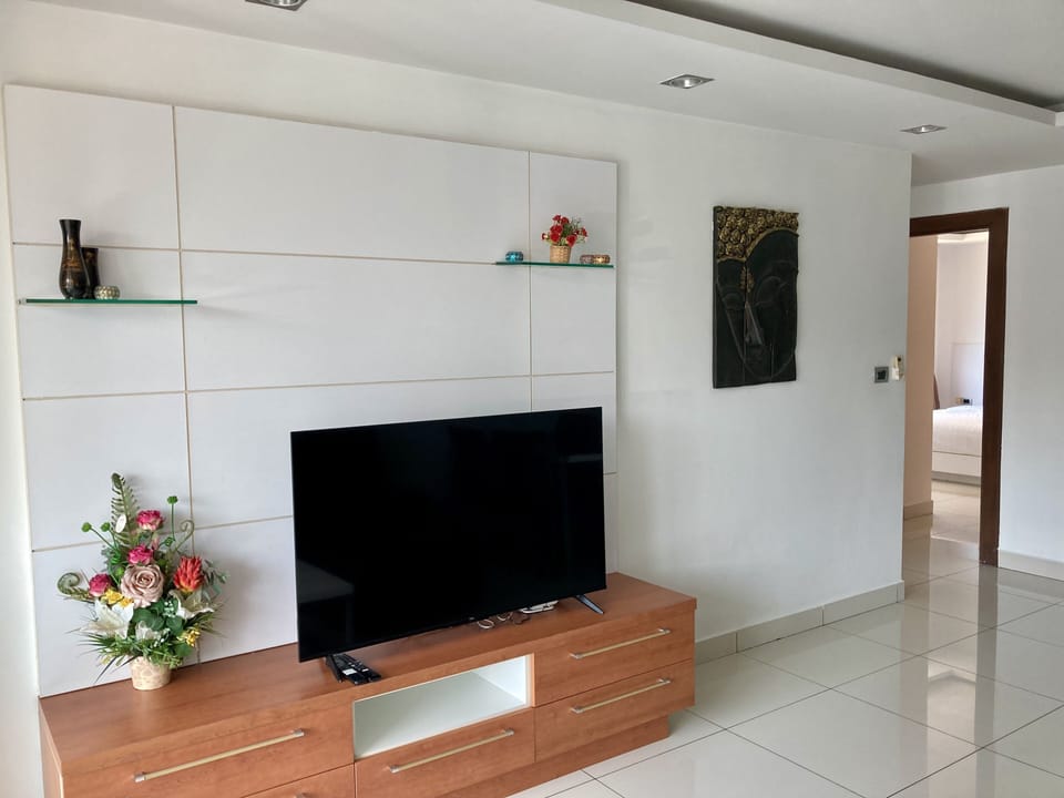 Condo, 2 Bedrooms | Living area | Flat-screen TV
