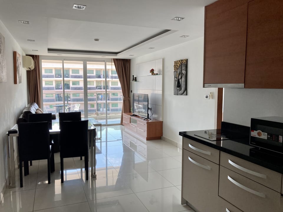 Condo, 2 Bedrooms | Living area | Flat-screen TV