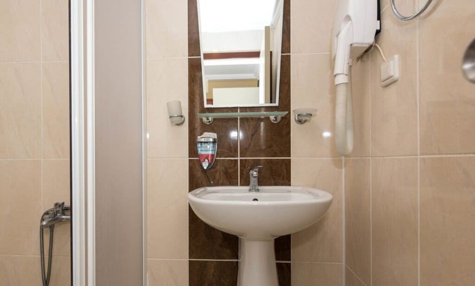 Standard Double or Twin Room, Multiple Beds | Bathroom | Shower, rainfall showerhead, hair dryer, slippers