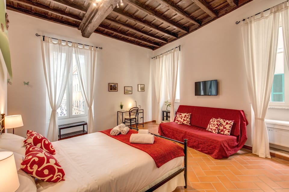 Deluxe Quadruple Room | In-room safe, desk, free WiFi, bed sheets