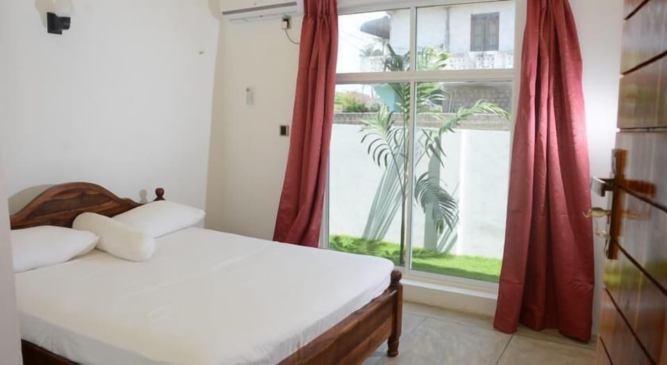 Deluxe Double Room, Garden View | Desk, soundproofing, iron/ironing board, free rollaway beds