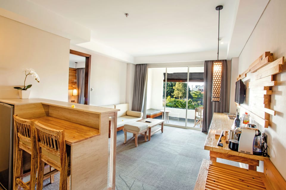 Kecak Suite, 2 Bedrooms, Living Room & Balcony | Living area | 32-inch flat-screen TV with satellite channels, TV
