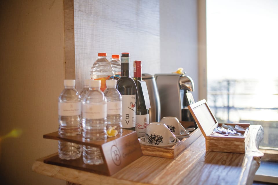 Legong Suite, Bathtub & Balcony | Minibar, in-room safe, desk, laptop workspace