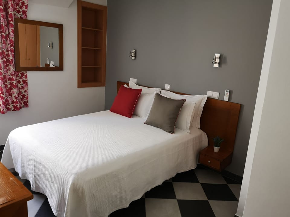 Economy Double Room | In-room safe, desk, blackout drapes, iron/ironing board