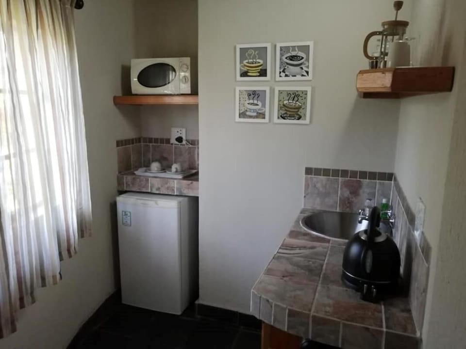 Coffee/tea maker, fridge, microwave, electric kettle