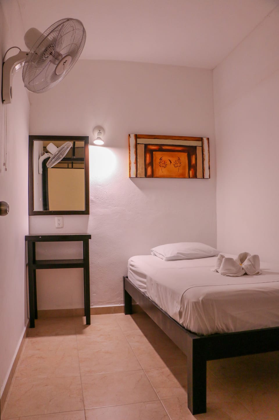 Basic Room, 1 Twin Bed, Non Smoking, Shared Bathroom | Laptop workspace, WiFi (free), bed sheets