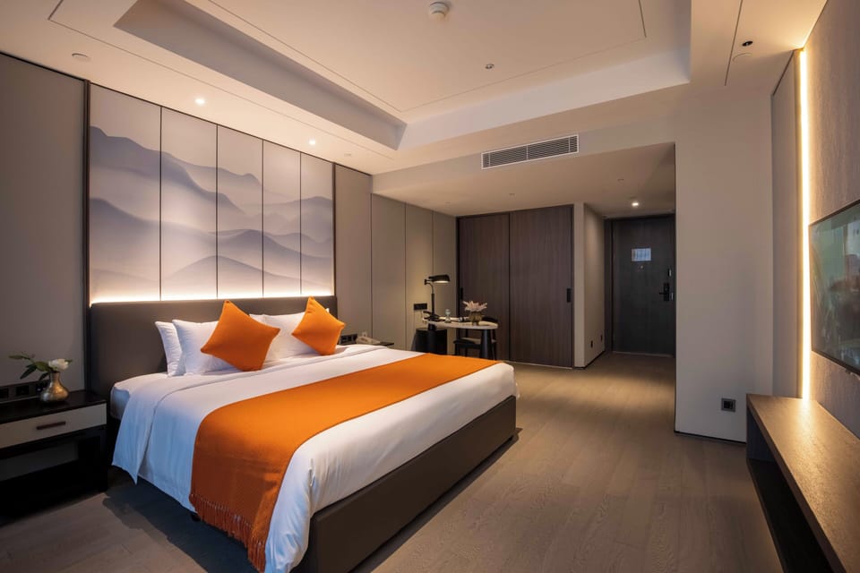 Deluxe King With View | In-room safe, desk, blackout drapes, free WiFi