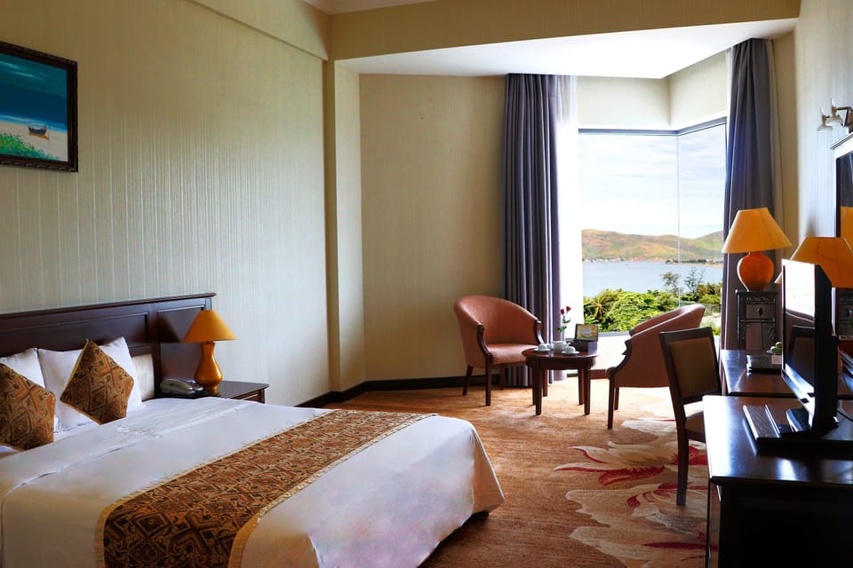 Luxury Double Room, Sea View | 1 bedroom, minibar, in-room safe, desk