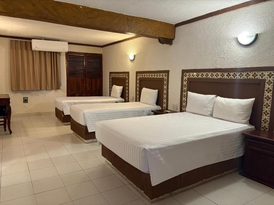 Superior Triple Room | Down comforters, individually decorated, individually furnished, desk