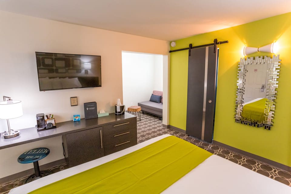 Suite, 1 King Bed with Sofa bed, Non Smoking | Living area | 42-inch flat-screen TV with digital channels, TV