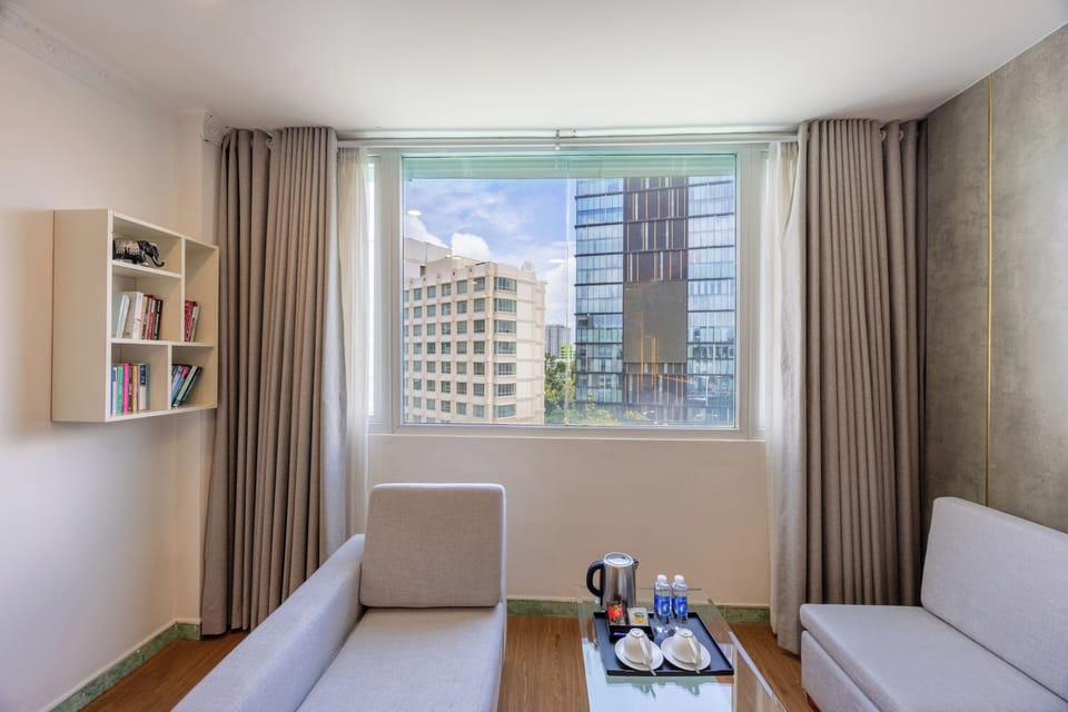 Deluxe Room | Minibar, blackout drapes, iron/ironing board, free WiFi