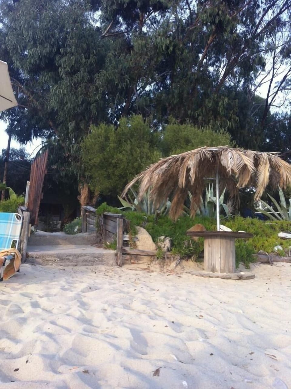 On the beach, sun loungers, beach umbrellas, beach towels
