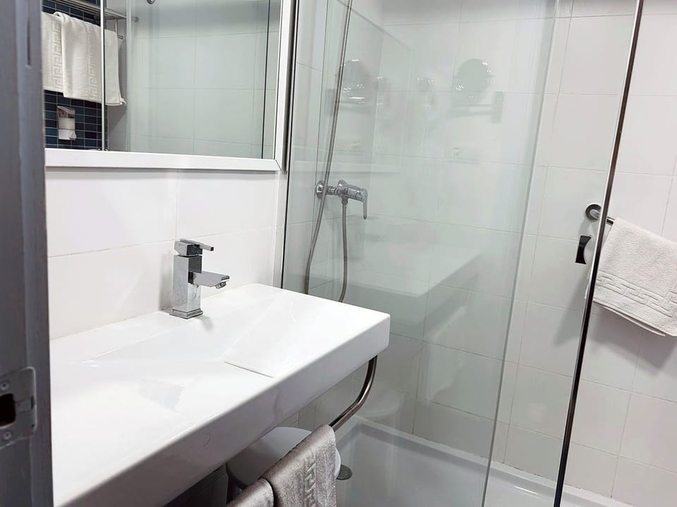 Double Room, Sea View | Bathroom | Shower, free toiletries, hair dryer, towels