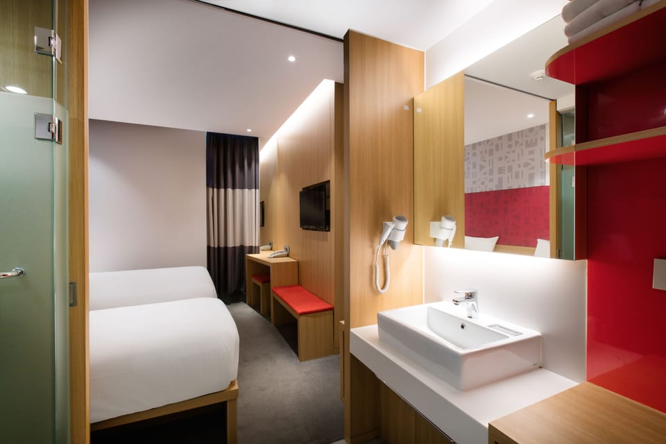 Shower, hair dryer, slippers, towels