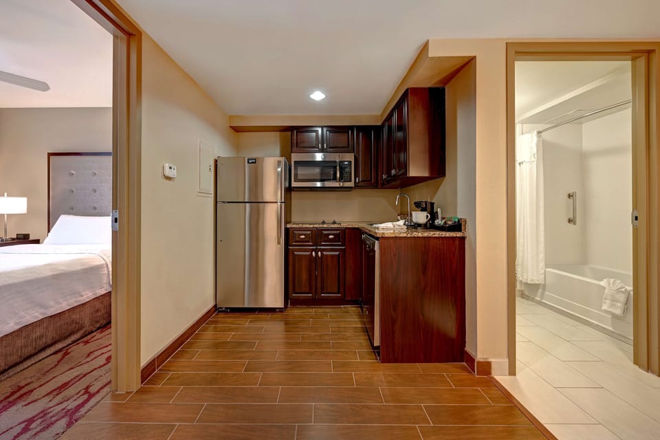 Suite, 1 Bedroom, Non Smoking | Private kitchen | Fridge, microwave, stovetop, dishwasher