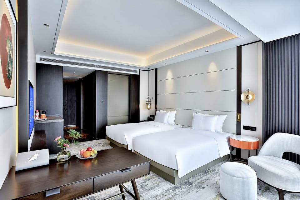 Superior Twin Room | Minibar, in-room safe, desk, blackout drapes