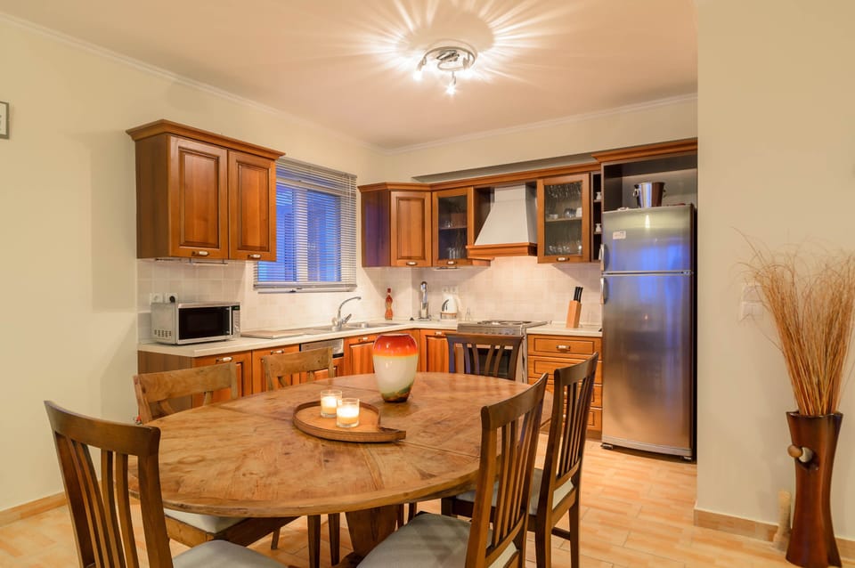 Apartment, 3 Bedrooms, Sea View | Private kitchen | Full-size fridge, microwave, oven, stovetop