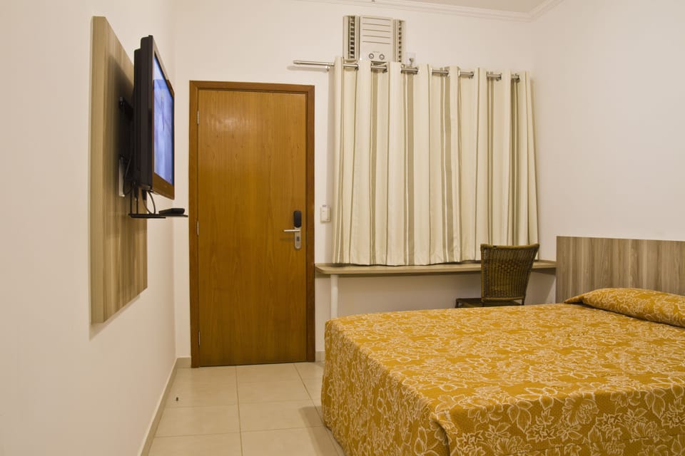 Standard Single Room | Minibar, desk, blackout drapes, rollaway beds