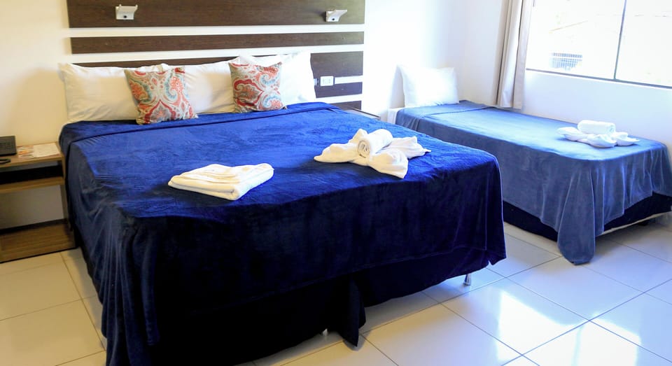 Family Room | Minibar, desk, free WiFi