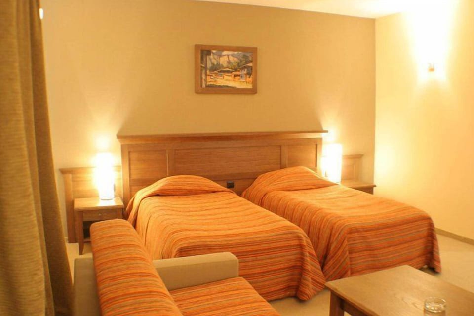 Desk, blackout drapes, iron/ironing board (on request), WiFi (free)