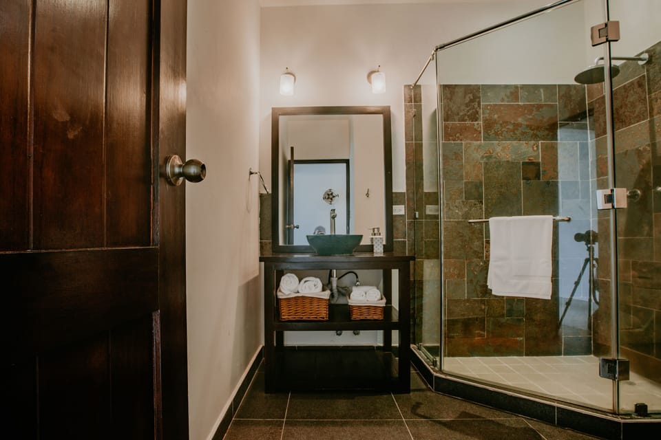 Deluxe Double Room, 1 King Bed, Mountain View | Bathroom | Shower, free toiletries, hair dryer, towels