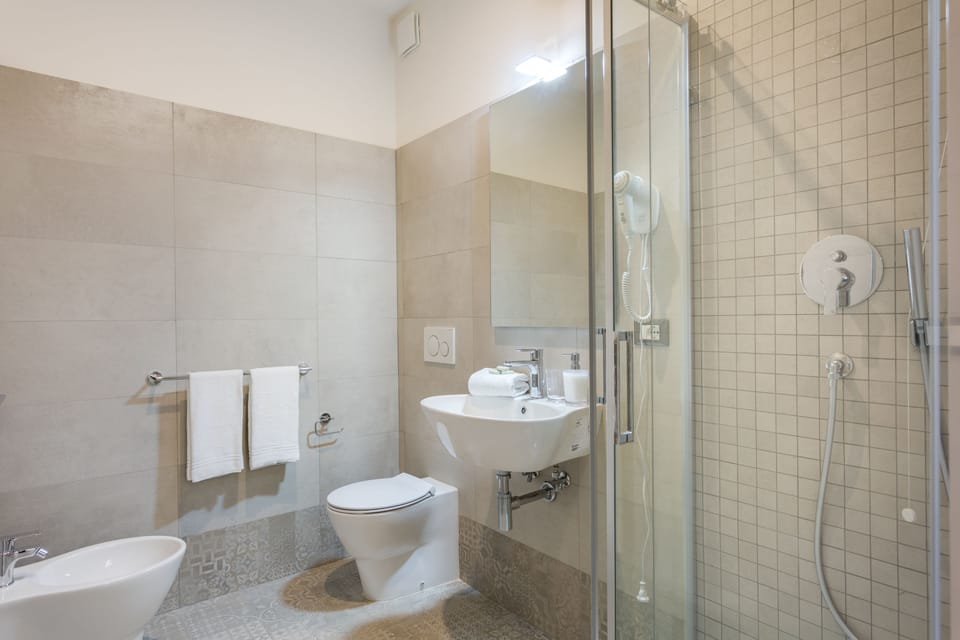 Duplex (Beatrice) | Bathroom | Shower, rainfall showerhead, free toiletries, hair dryer