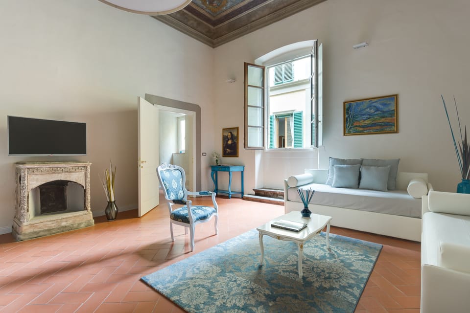 Luxury Quadruple Room (Da Vinci) | Living room | 43-inch flat-screen TV with digital channels, TV
