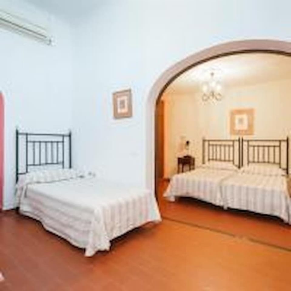 Family Quadruple Room | Desk, bed sheets