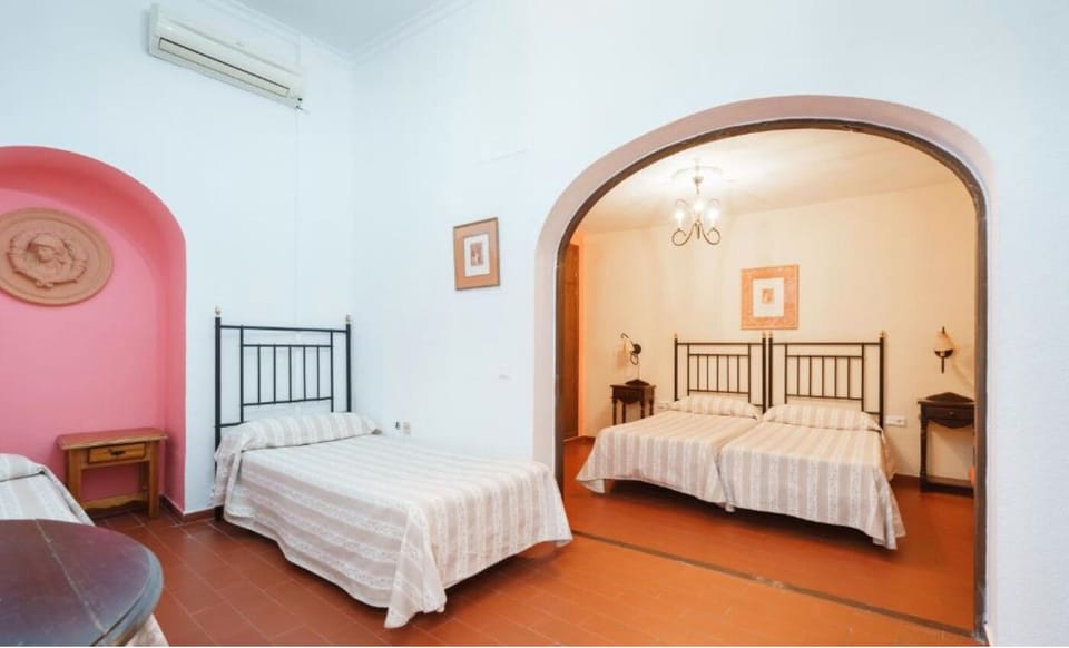 Family Quadruple Room | Desk, bed sheets