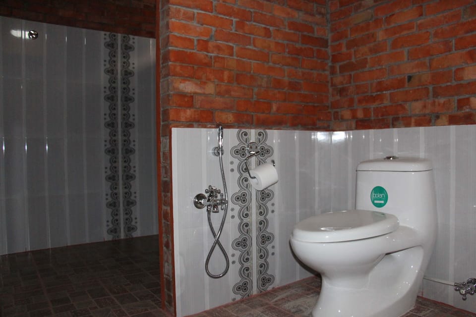 Shower, free toiletries, slippers, towels