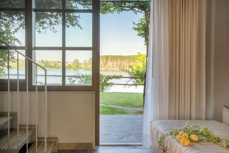 Suite, 2 Bedrooms, Lake View | Minibar, in-room safe, desk, soundproofing