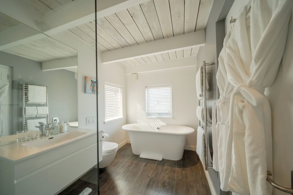 Premium Suite, Partial Sea View | Bathroom | Shower, designer toiletries, hair dryer, bathrobes