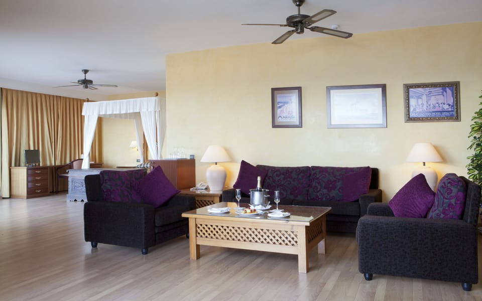 Presidential Suite | Living area | 32-inch TV with satellite channels