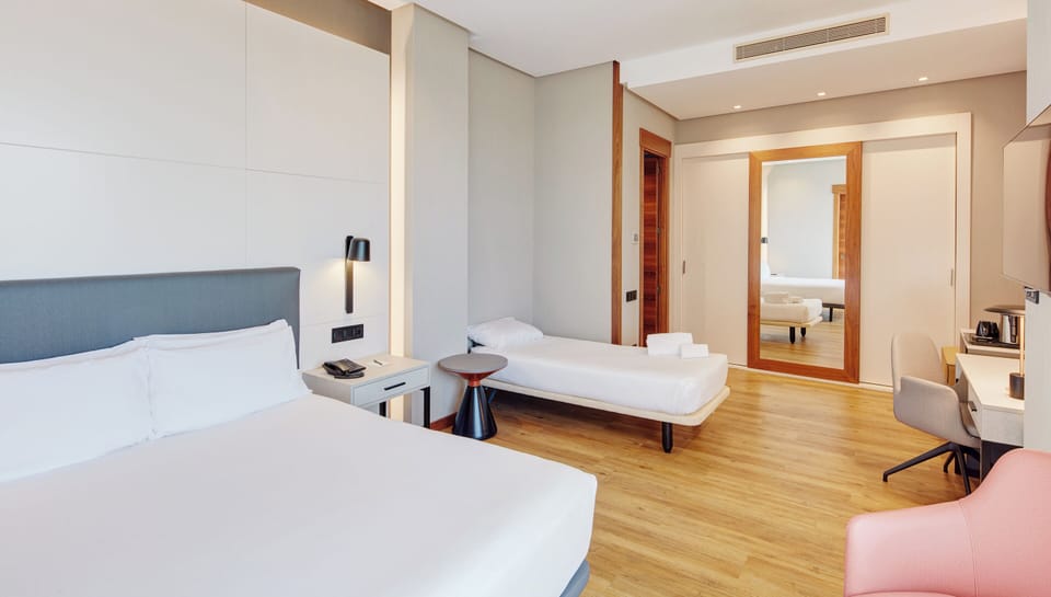 Premium bedding, down comforters, minibar, in-room safe