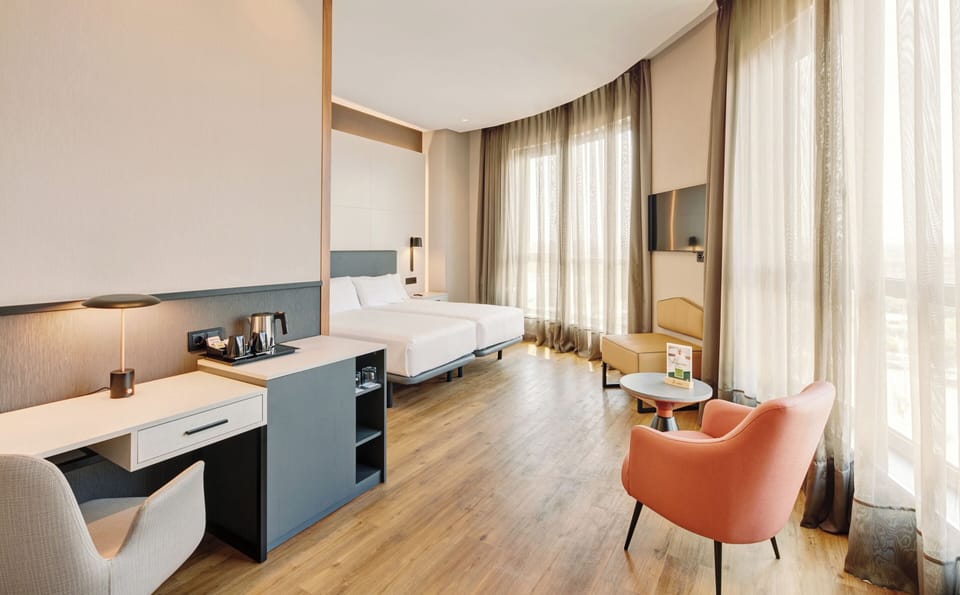 Premium bedding, down comforters, minibar, in-room safe