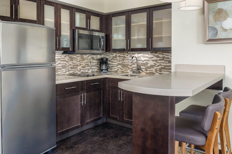 Suite, 1 Bedroom, Kitchen | Private kitchen | Full-size fridge, microwave, coffee/tea maker, cookware/dishes/utensils