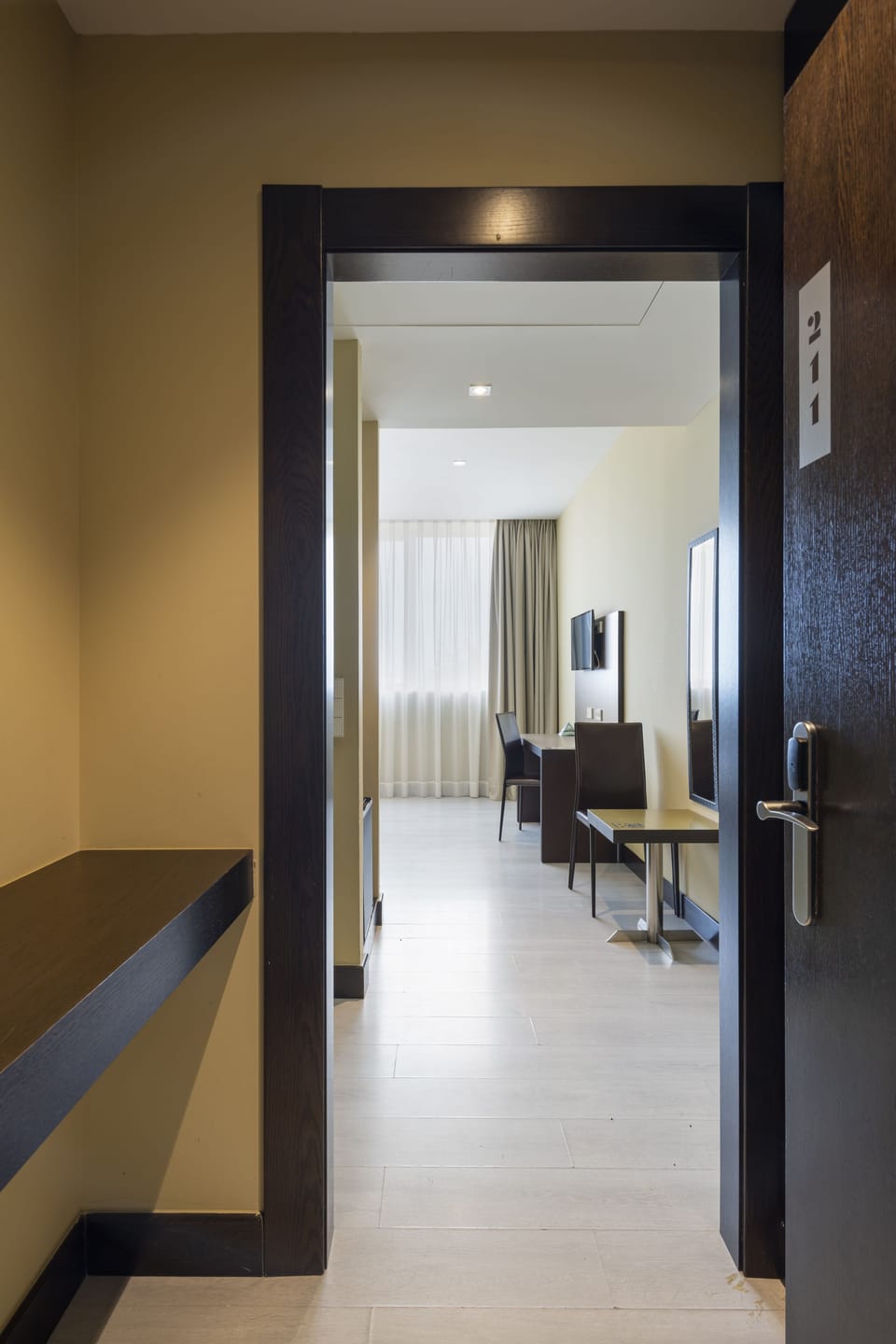 Standard Double Room | Minibar, in-room safe, desk, blackout drapes
