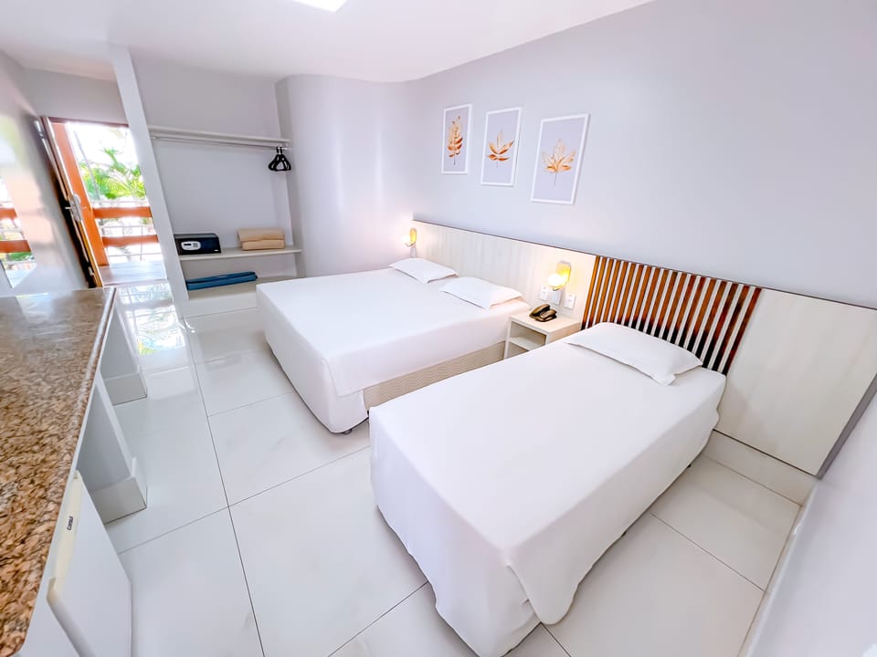 Standard Triple Room | In-room safe, desk, blackout drapes, free cribs/infant beds