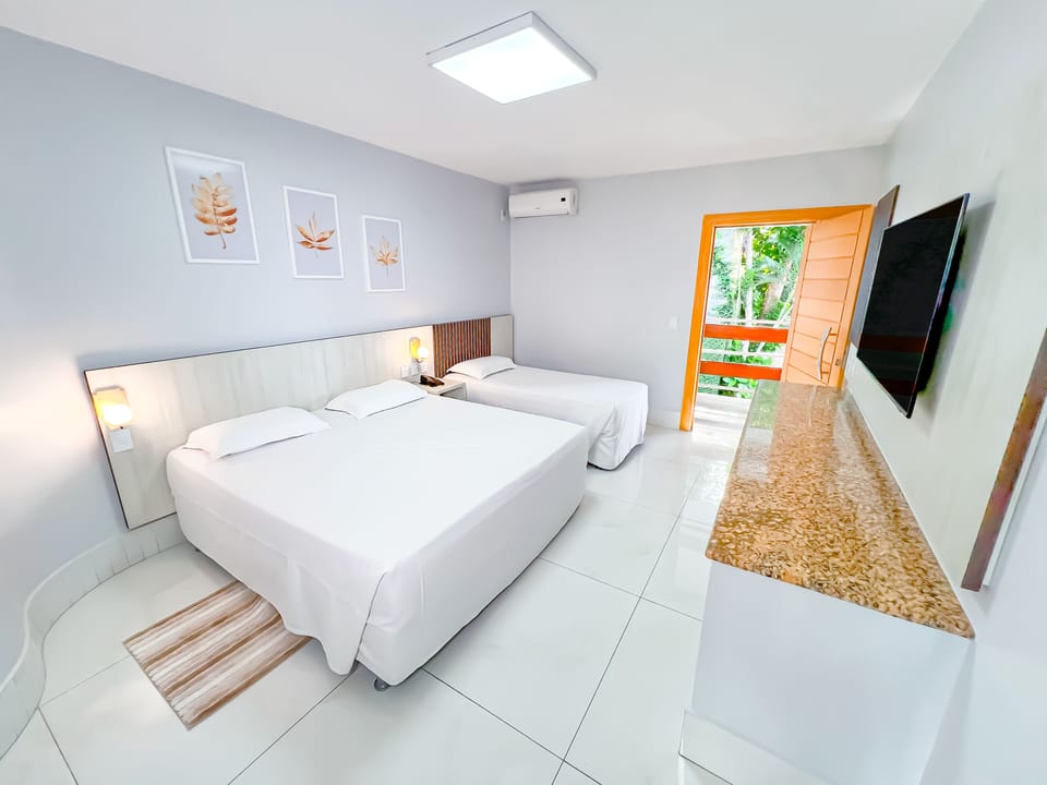Standard Triple Room | In-room safe, desk, blackout drapes, free cribs/infant beds