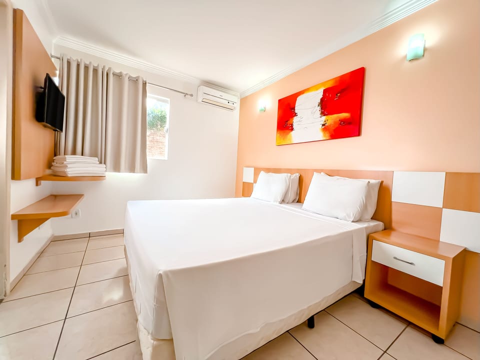 Standard Suite | Minibar, in-room safe, blackout drapes, iron/ironing board