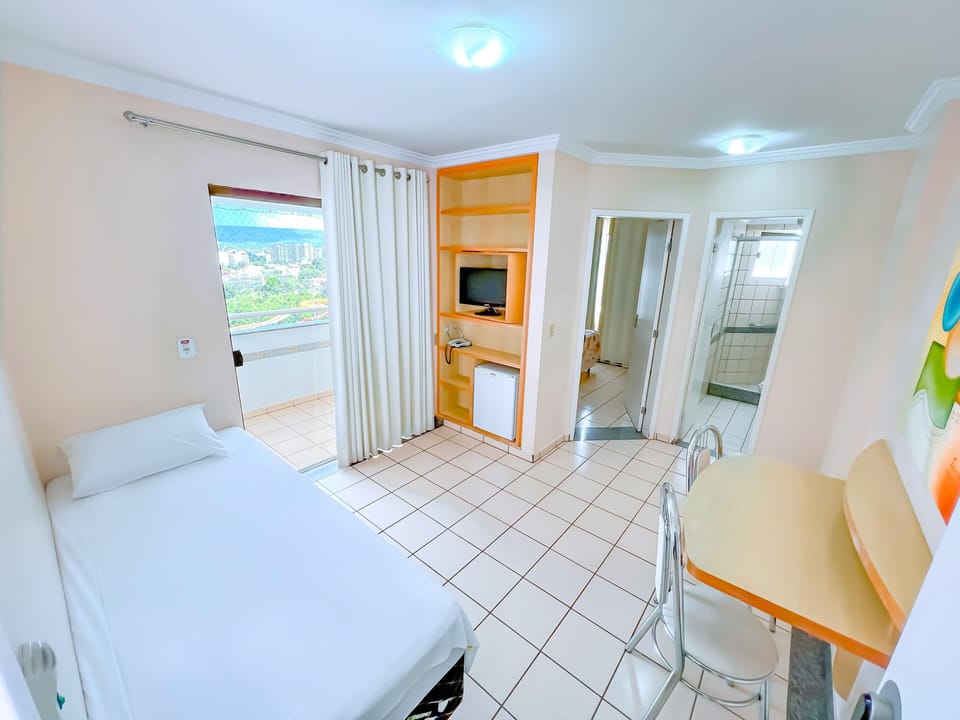 Standard Double Room | Minibar, in-room safe, desk, blackout drapes